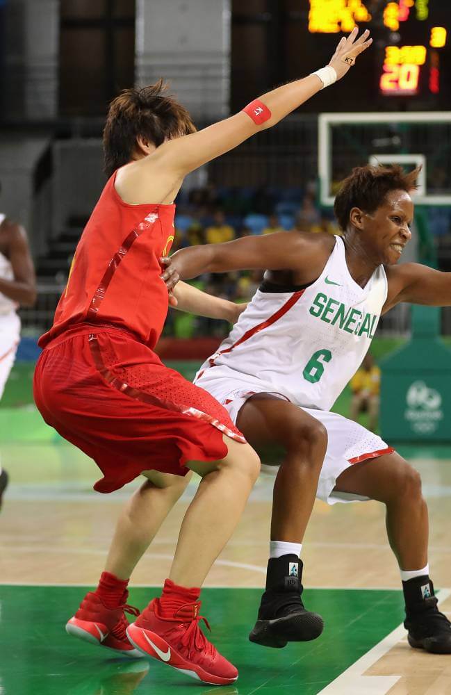 RIO DE JANEIRO, BRAZIL - AUGUST 08: Bintou Dieme #6 of Senegal handles the ball during the women's basketball game against China on Day 3 of the Rio 2016 Olympic Games at the Youth Arena on August 8, 2016 in Rio de Janeiro, Brazil. (Photo by Christian Petersen/Getty Images)