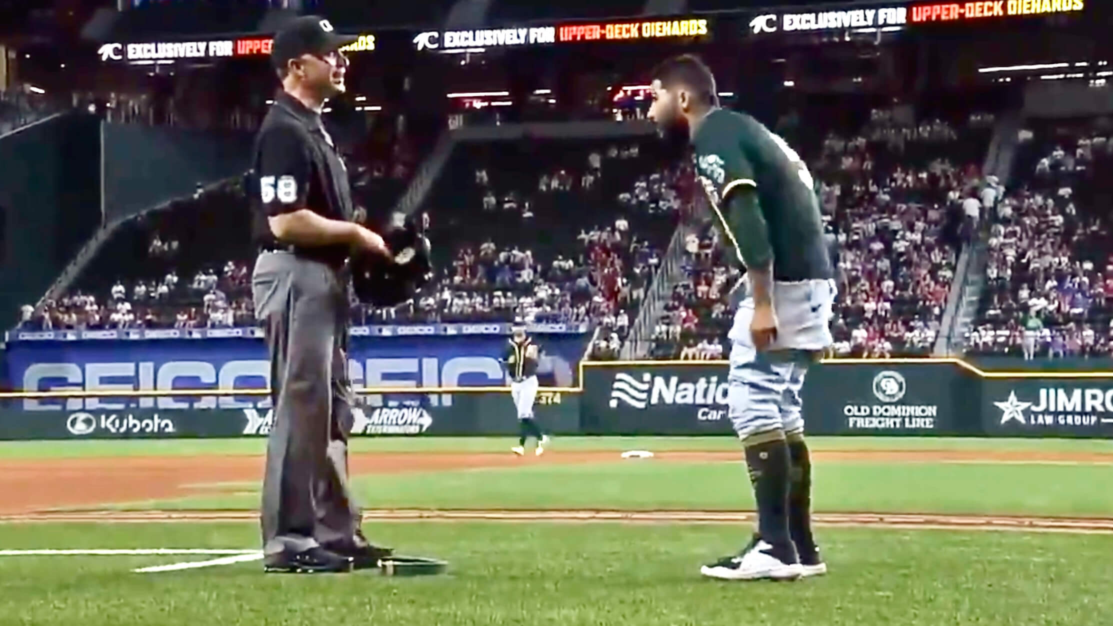 A's pitcher Sergio Romo outdoes Max Scherzer by dropping pants for ump