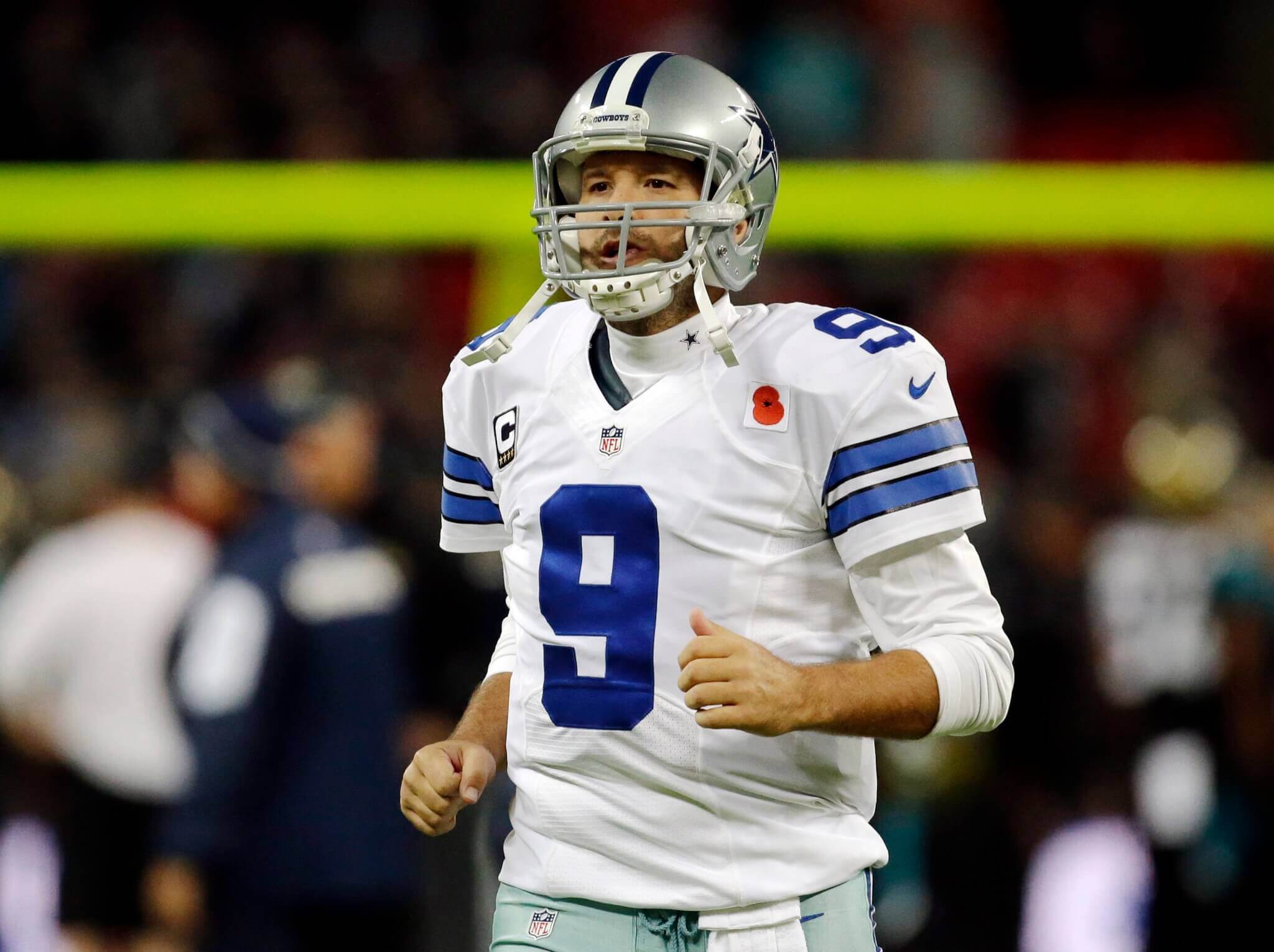 Cowboys wearing helmets with special red stripe