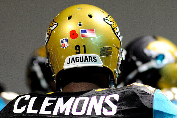 Cowboys wearing helmets with special red stripe