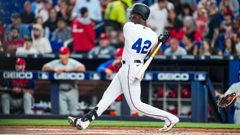 MLB on X: To honor the 75th anniversary of Jackie Robinson breaking the  color barrier, the @Dodgers and @Royals are wearing throwback uniforms  tonight!  / X