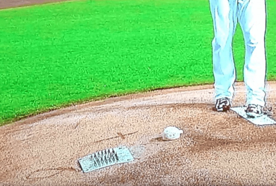 A detailed view of the pitchers mound with the 4 ALS logo prior to