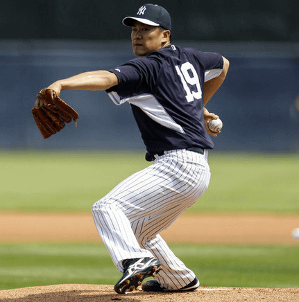 Japanese baseball pitcher Masahiro Tanaka wearing his jersey poses